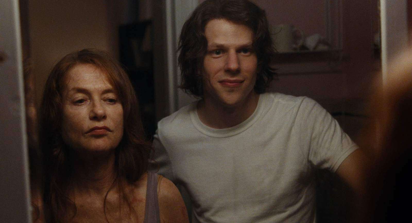 Isabelle Huppert as Isabelle and Jesse Eisenberg as Jonah in Louder Than Bombs, courtesy of The Orchard. This is the film for which we first heard Trier use the term 'dirty formalism' to describe his work. Trier used the term 'dirty formalism' to describe his approach to Louder Than Bombs.