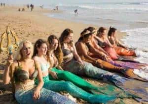 A group of Mermaids on Huntington Beach in Ali Weinstein's documentary