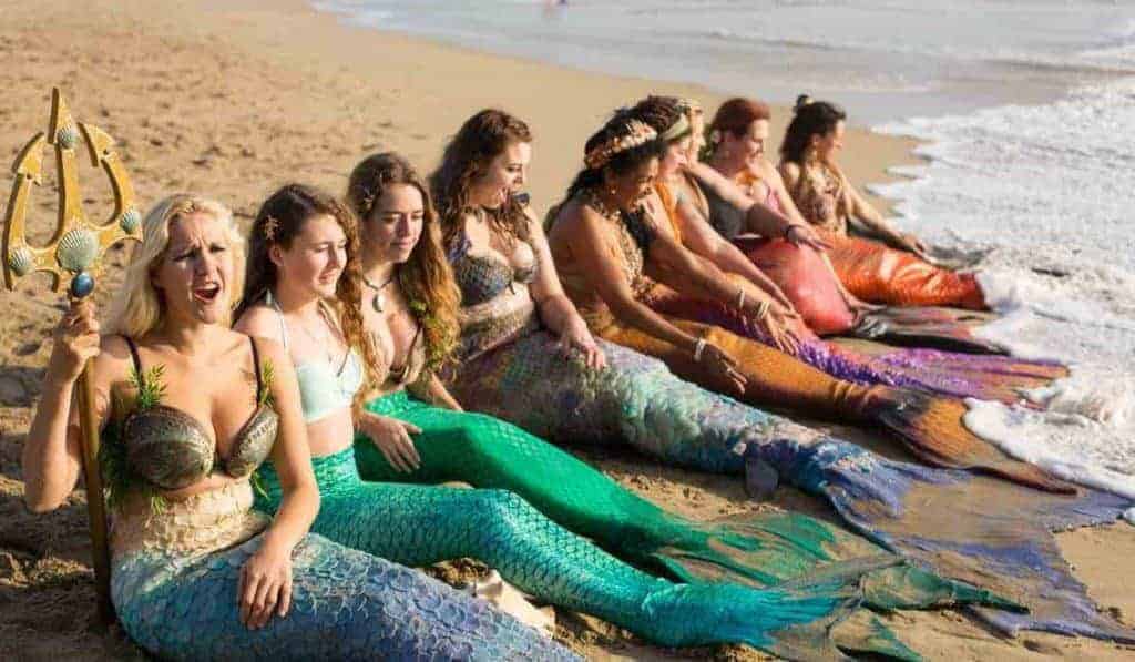 A group of Mermaids on Huntington Beach in Ali Weinstein's documentary