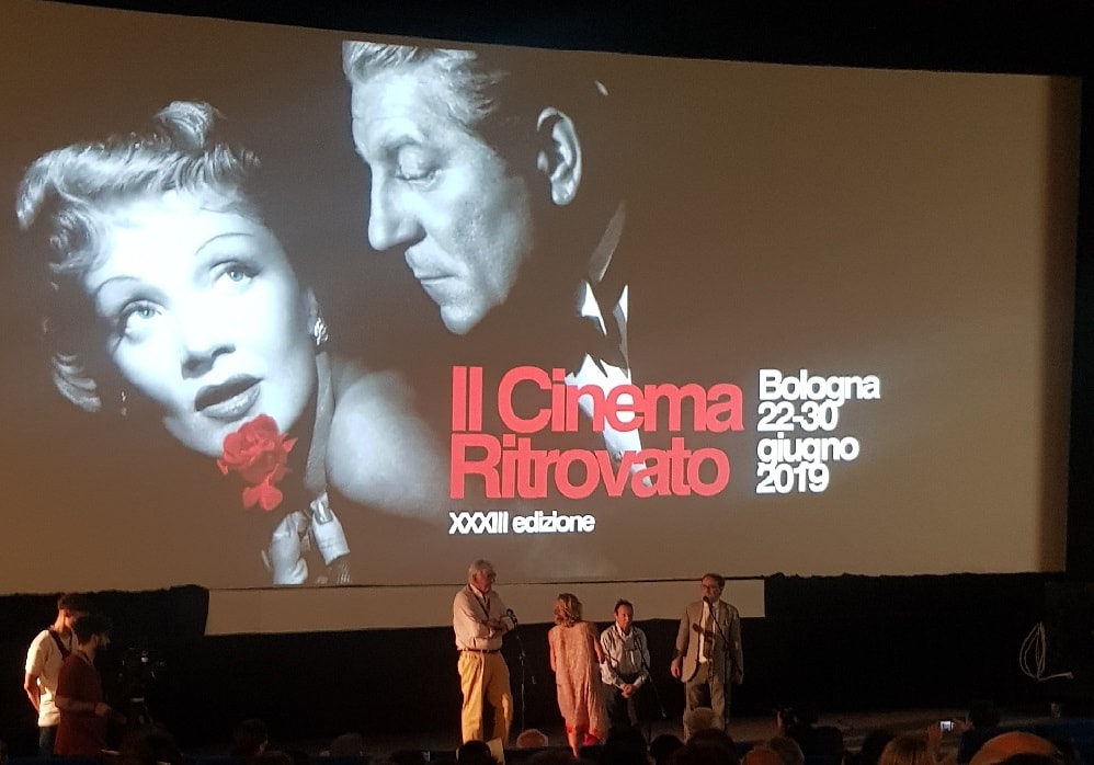  Fellini recurring player Alvaro Vitali and cameraman Blasco Guitaro on stage at Il Cinema Ritrovato  (Photo by B. P. Flanagan)
