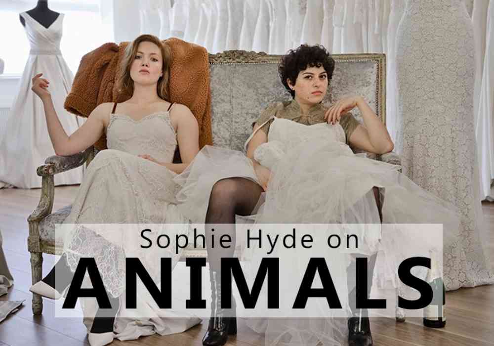 Holliday Grainger and Alia Shawkat slouch in a bridal store in a still from Sophie Hyde's Animals