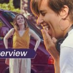 An image of Kris Rey superimposed over a still from her film, I Used to Go Here, featuring Gillian Jacobs. The image has the text, Interview, over it.