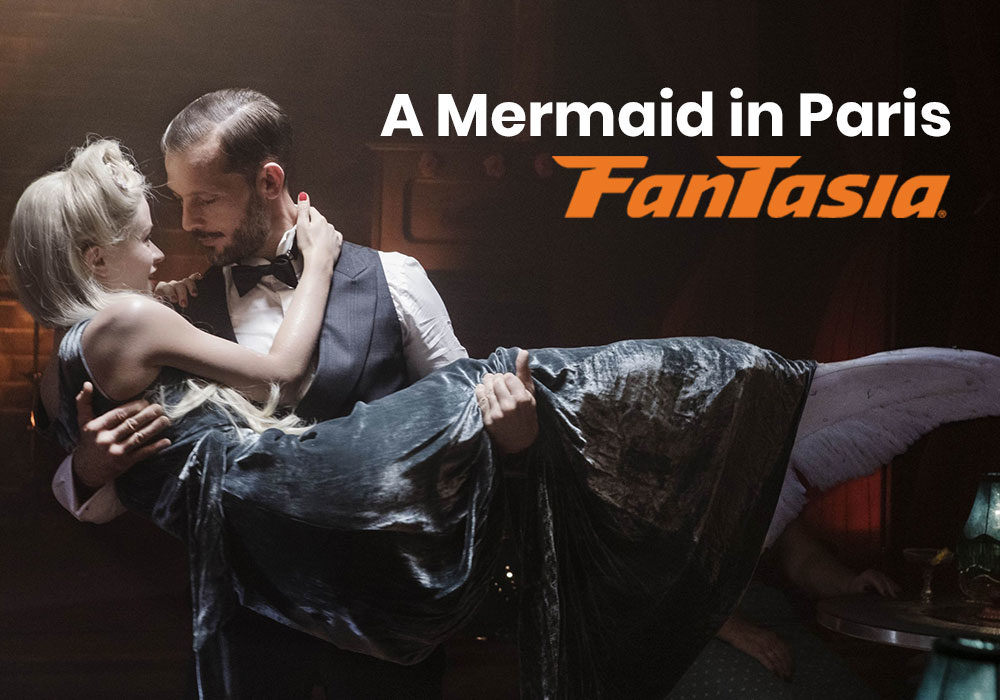 A man holds a mermaid in the still from the French film A Mermaid in Paris, currently playing at the Fantasia Film Festival.