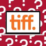 The TIFF logo on a latop on a background of question marks.