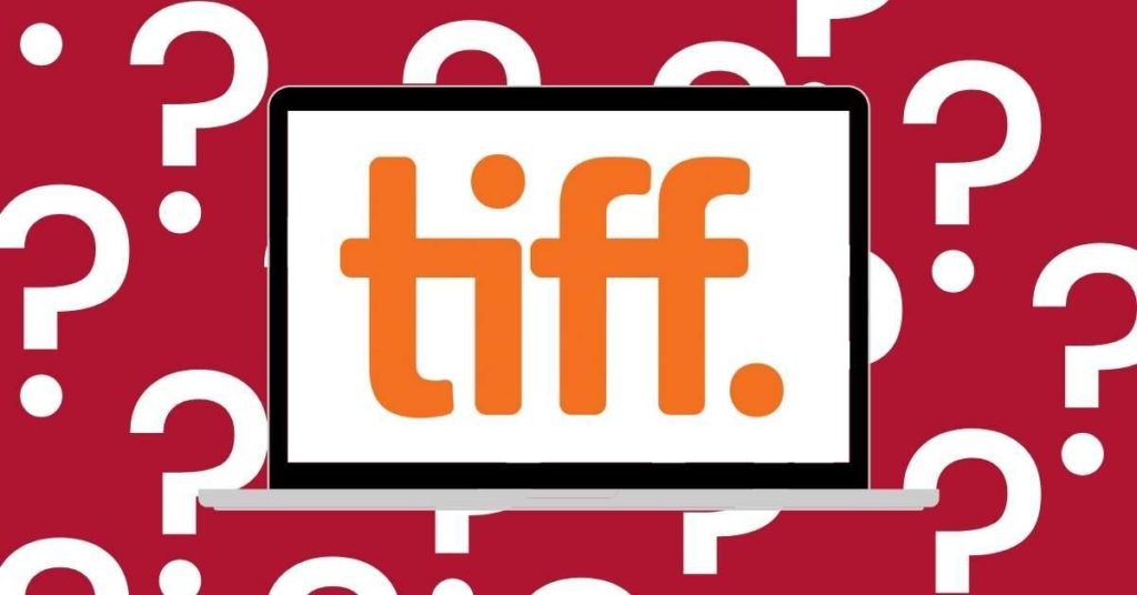 The TIFF logo on a latop on a background of question marks.