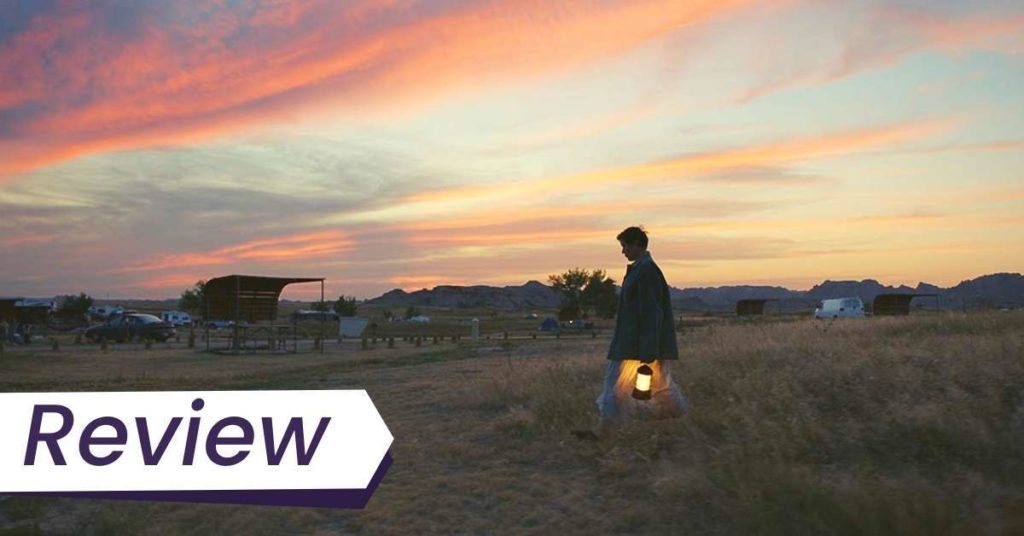 Frances McDormand stars in Chloé Zhao's Nomadland. McDormand is in almost silhouette walking through a park at sunset. Photo courtesy of TIFF.