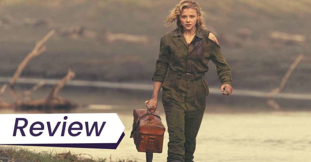 Chloë Grace Moretz in flight officer uniform, carrying a briefcase, in Shadow in the Cloud.