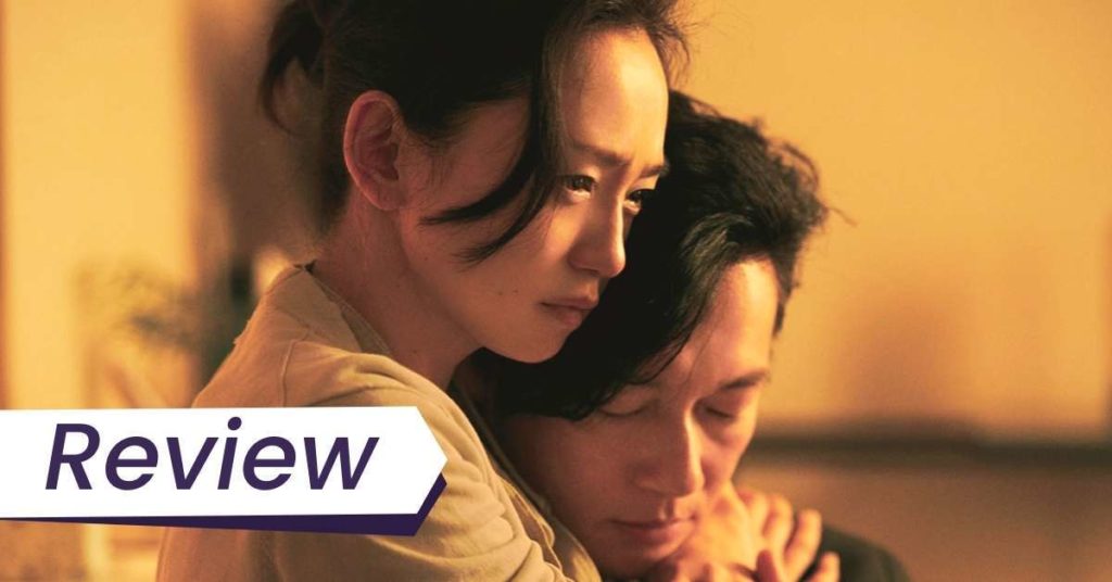 A couple embraces in Naomi Kawase's True Mothers.
