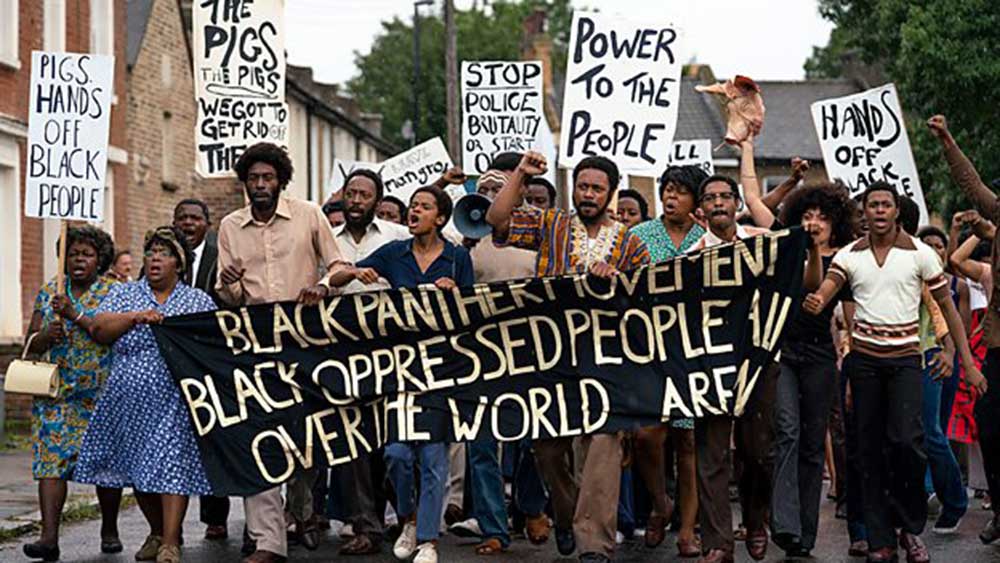 A group of Black Londoners protest against the police in Mangrove.