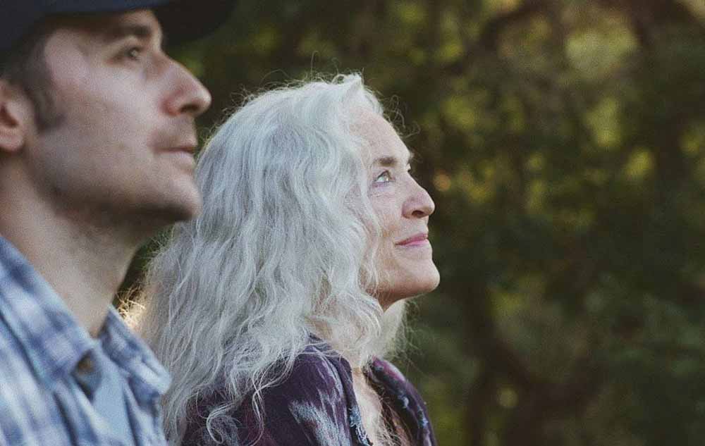 A still from Freeland, which is playing Indie Memphis 2020. In the still a man and a woman look up at the sky.