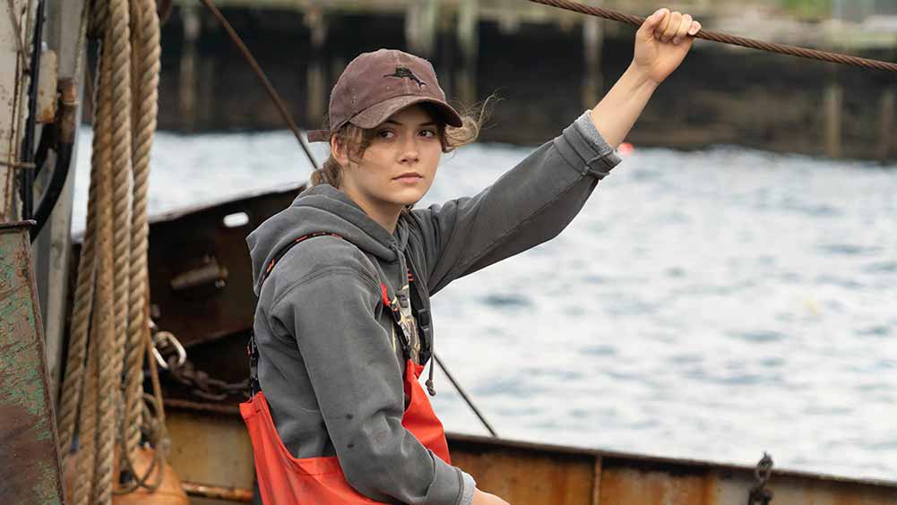 A closeup of a young woman on a boat in CODA, one of the best films of Sundance 2021.