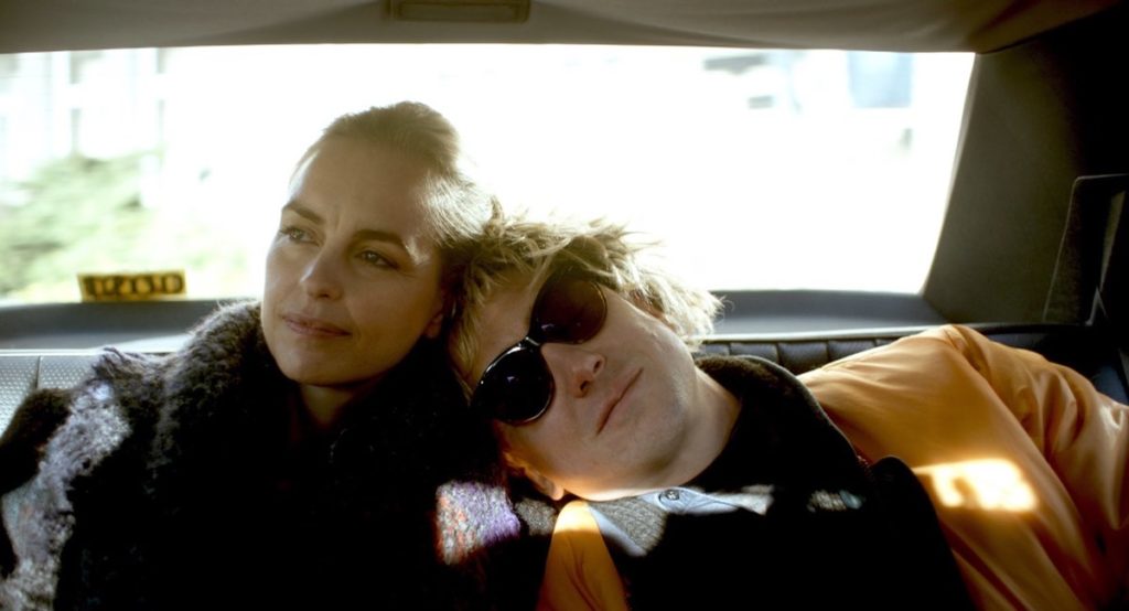 Nina Hoss and Lars Eidinger star as twins in My Little Sister. Courtesy of Film Movement.Seated in the back of a cab, Sven (Eidinger in a blond wig) rests his head on Lisa's (Hoss) shoulder.