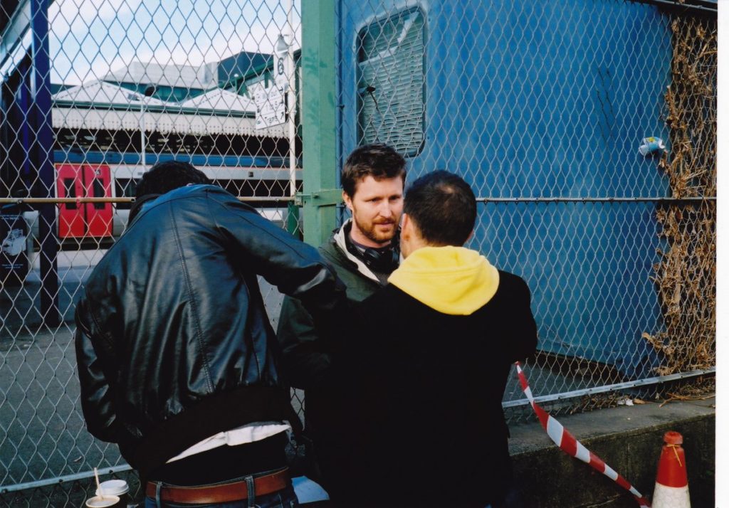 Director Andrew Haigh on the set of Weekend with actors Tom Cullen and Chris New. Photo courtesy of Criterion Channel.