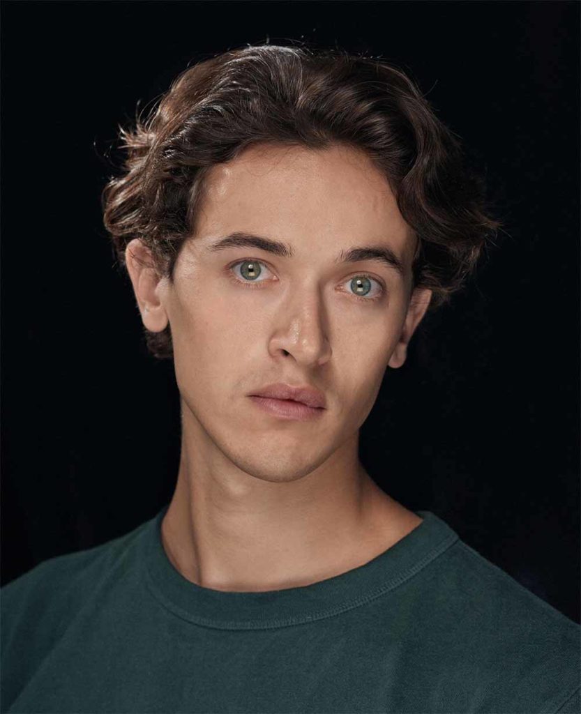 A headshot of Tom Blyth, one of the most exciting emerging actors at TIFF 2021.