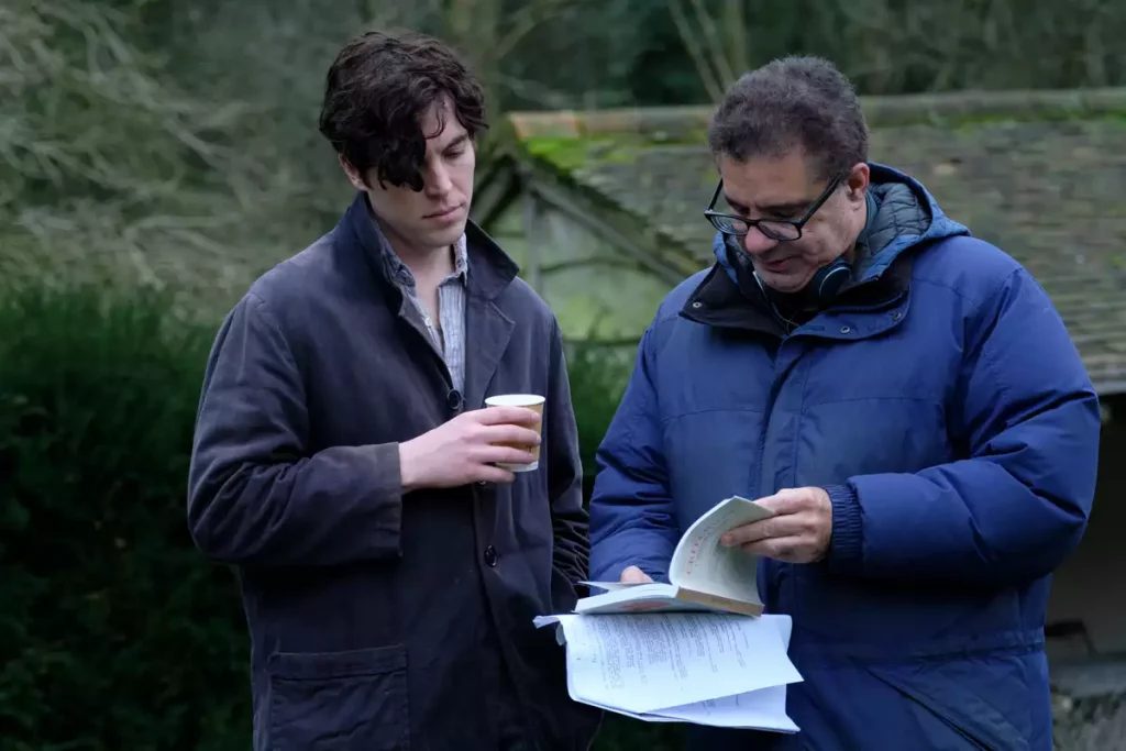 Tom Hughes on the set of The Laureate with his director