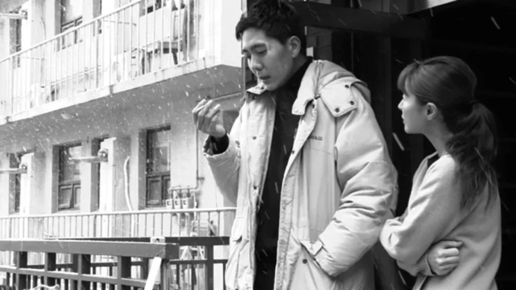 Young-ho, played by Seok-ho Shin, (left) in a still from Hong Sangsoo's Introduction