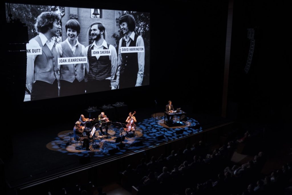 A live performance of the live documentary A Thousand Thoughts featuring Kronos Quartet on stage. The seed of the idea for 32 Sounds was planted in the making of A Thousand Thoughts.