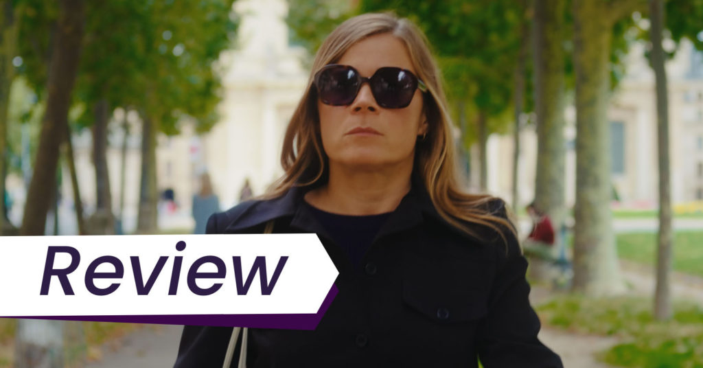 Blanche Gardin stars as Jeanne in Everybody Loves Jeanne, the feature debut from Céline Devaux, screening in the Semaine de la Critique at Cannes 2022. Jeanne is dressed in black with sunglasses as she walks through a promenade in Paris.