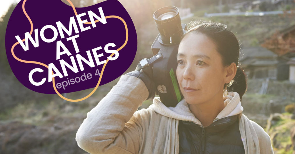 Naomi Kawase holding a camera, standing outside in a rocky area. The Woman at Cannes: Episode 4 logo is next to her.