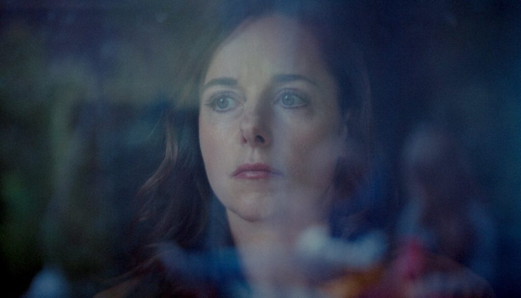 Laure Calamy stars as Julie in Éric Gravel's film Full Time, his second feature film. Seen in closeup, Julie has quiet moment of stressed panic.