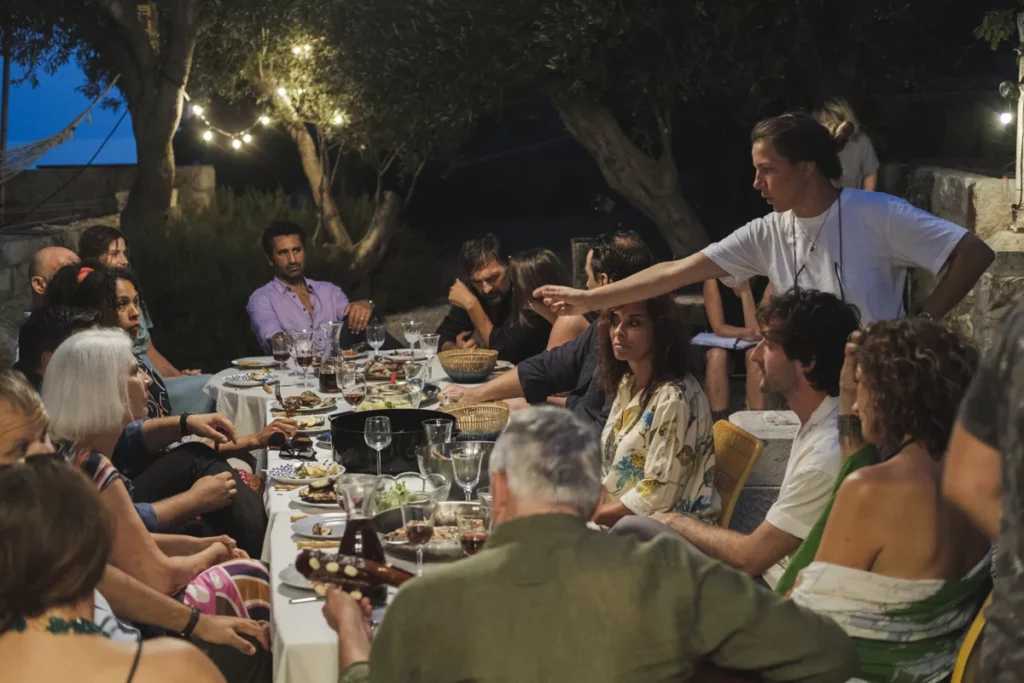 Antoneta Alamat Kusijanovic on the set of her first feature film Murina. She is directing a party scene featuring Javier, seated at the head of the table.