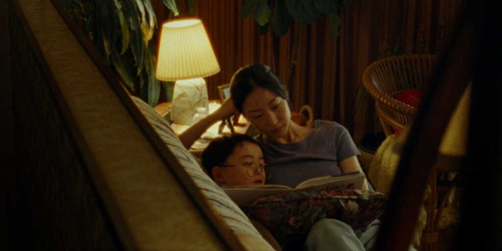 Dong-hyun (left) and So-young (right) read a book on the couch in Anthony Shim's film Riceboy Sleeps. Photo courtesy of TIFF. Camilo gets awoken by his grandson around whom his world starts to revolve in Katherine Jerkovic's film Coyote. Photo courtesy of TIFF. Riceboy Sleeps is discussed in the context of fellow films at TIFF about Canadian immigration stories Coyote and So Much Tenderness.