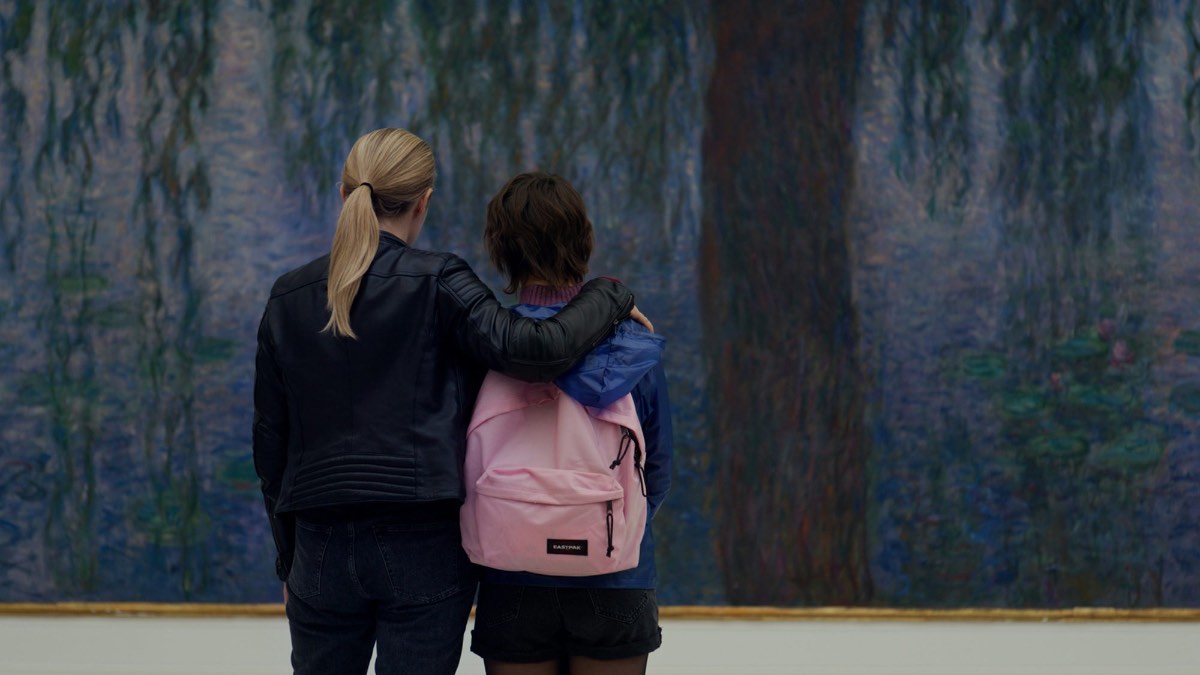 Mia (left) visits Monet's water lilies with the teenage girl whose parents died in the attack (left) in Revoir Paris, a film directed by Alice Winocour, who is interviewed in the film. She describes their new relationship as a kind of mother-daughter relationship.