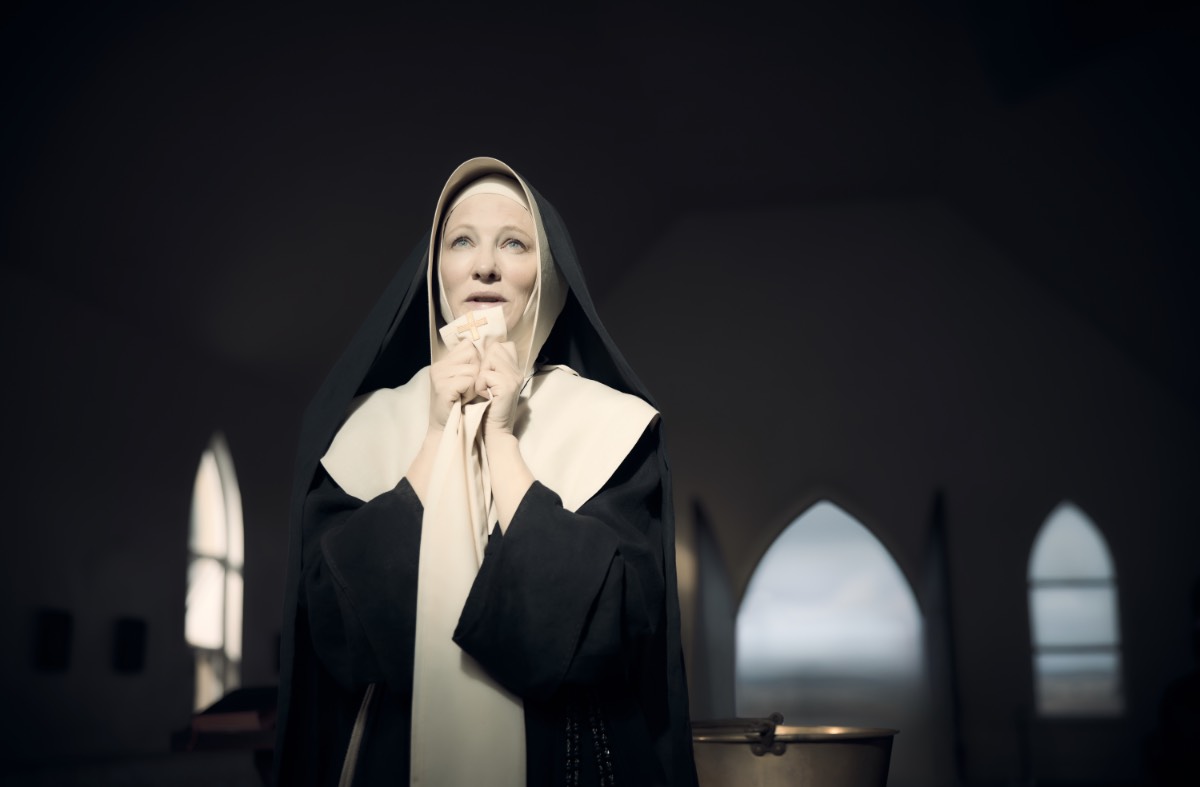 The arched windows in the church in The New Boy are pictured at the back of the frame. In this interview, Warwick Thornton discusses building this set for The New Boy and wanting it to be full of windows and arches, which is a very Christian colonial architect. Cate Blanchett as Sister Eileen is also pictured. Photo courtesy of Vertical.